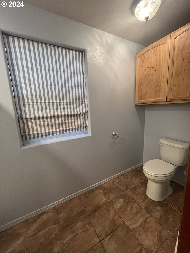 bathroom featuring toilet