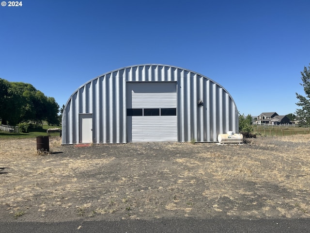 view of outdoor structure featuring a garage