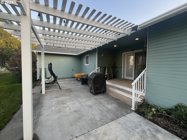 view of patio / terrace with a pergola and a deck