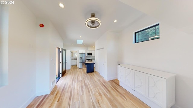 94256 11th St, Gold Beach, OR 97444 - hallway featuring light wood-style floors, recessed lighting, and baseboards