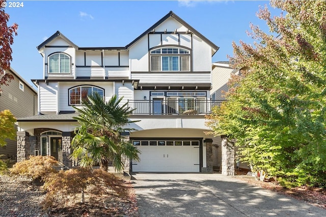 view of front of property with a garage