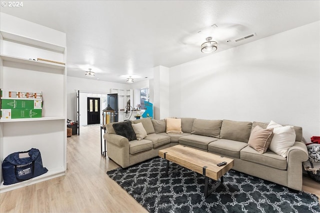 living room with hardwood / wood-style flooring