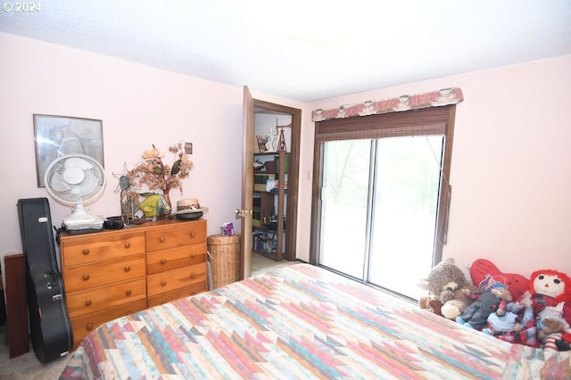 bedroom featuring carpet flooring and a closet