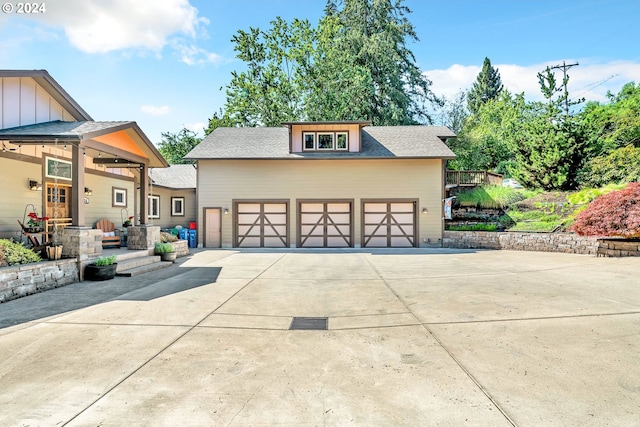 view of front of property with a garage