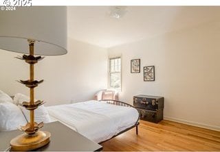 bedroom with light hardwood / wood-style flooring