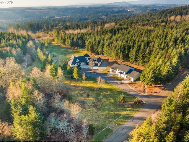 aerial view featuring a forest view