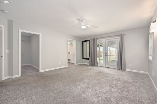 2823 SE Olsen St, Milwaukie, OR 97222 - carpeted empty room featuring ceiling fan, french doors, baseboards, and a smoke detector