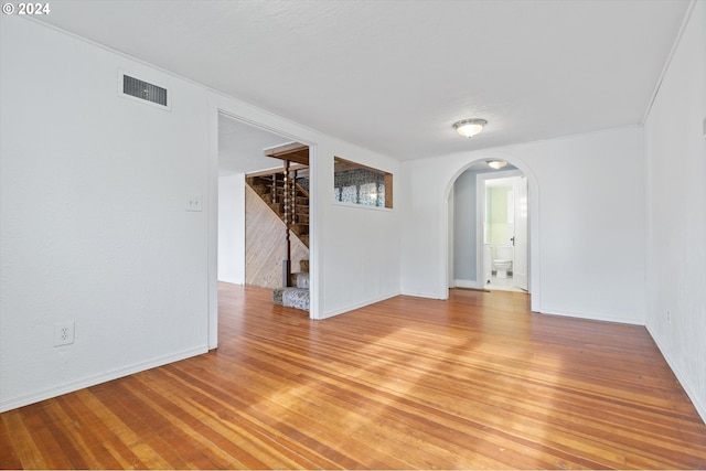 spare room featuring light hardwood / wood-style floors