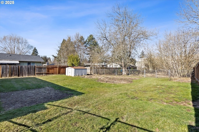 view of yard featuring a storage unit