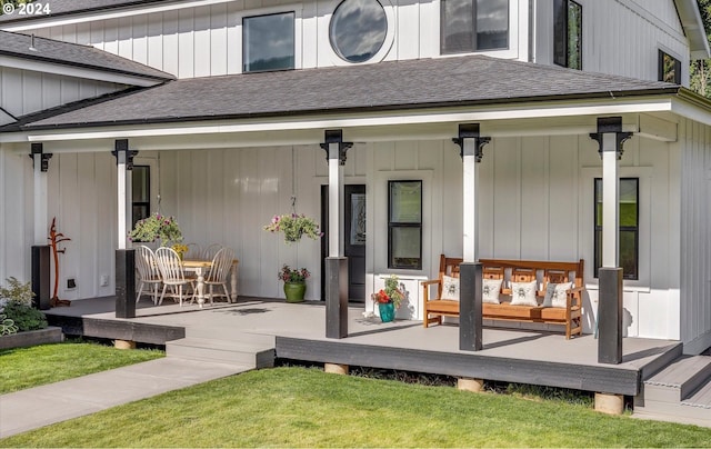 view of exterior entry featuring a porch