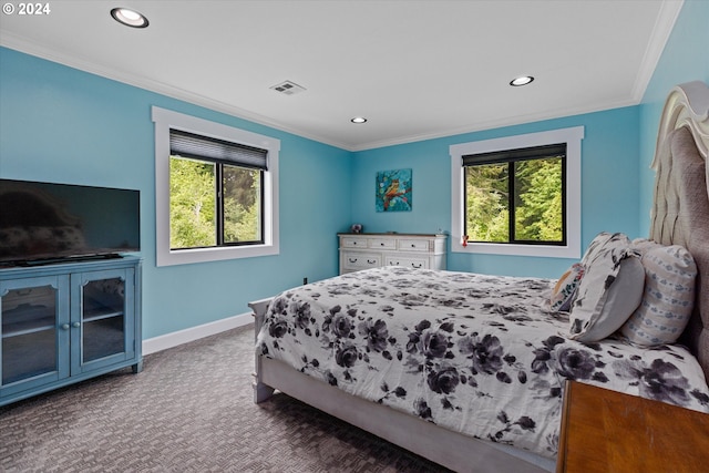 carpeted bedroom with crown molding