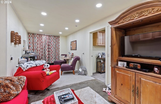 living room with dark carpet