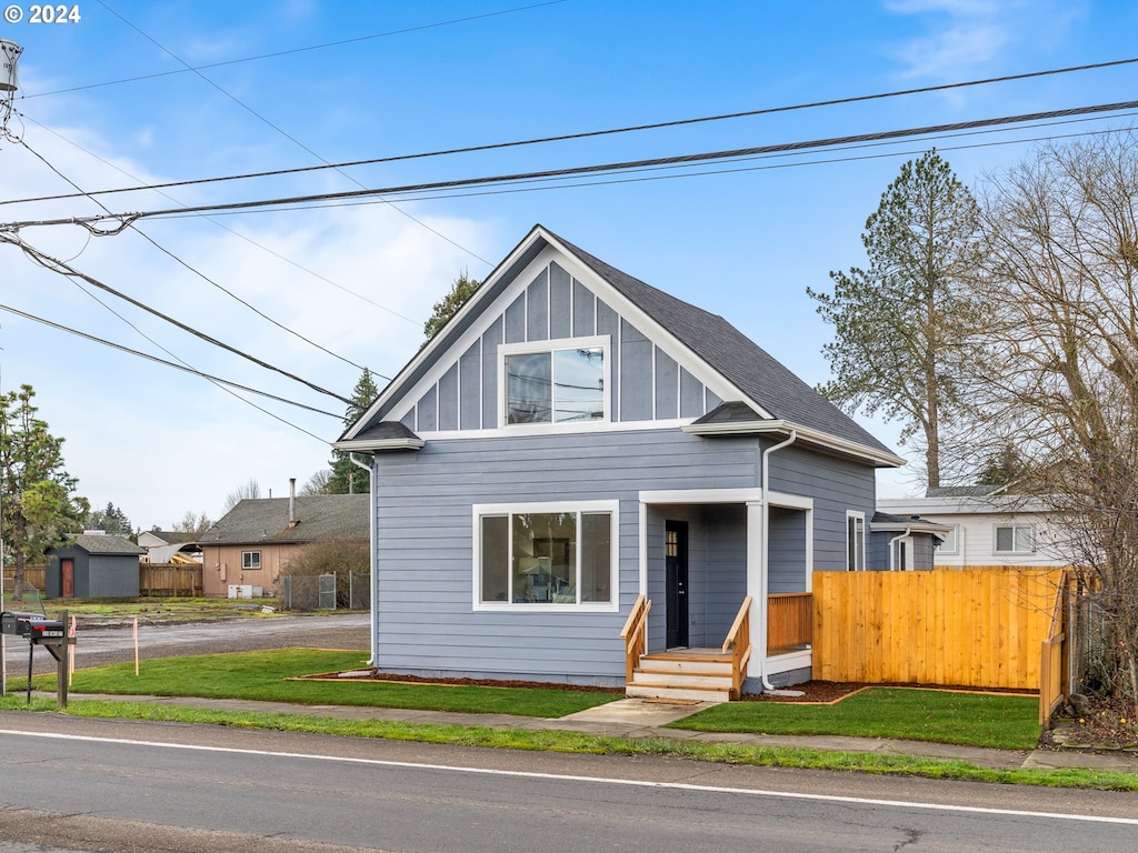 view of front of home with a front yard