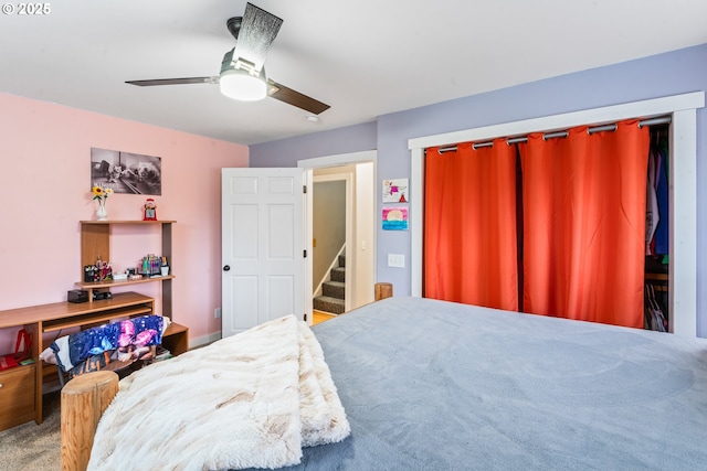 bedroom with ceiling fan and carpet flooring