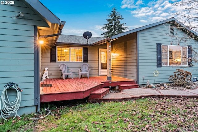 rear view of property with a deck