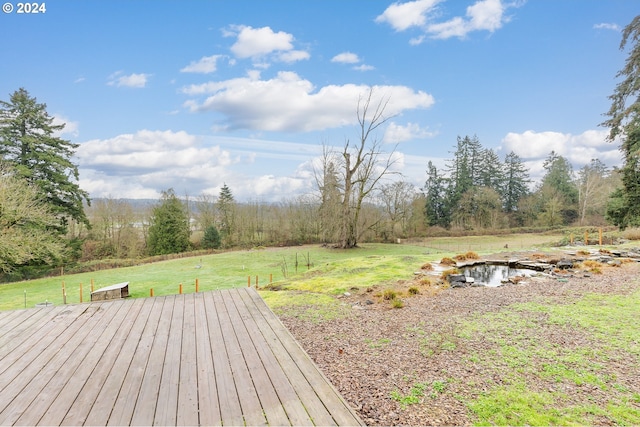 view of yard with a wooden deck