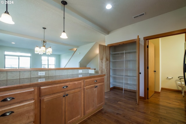 511 NE 84th Cir, Vancouver, WA 98665 - kitchen featuring brown cabinetry, pendant lighting, dark wood finished floors, a chandelier, and recessed lighting