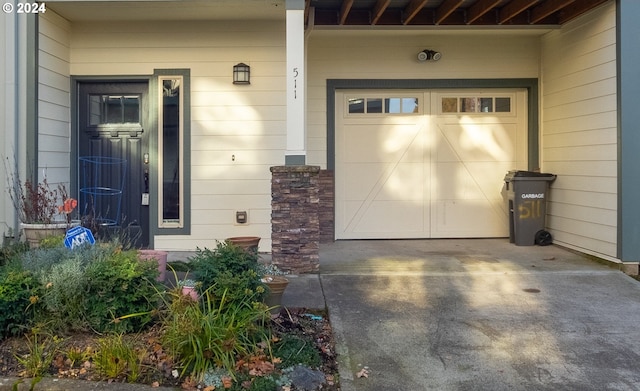 property entrance featuring a garage