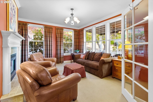 living room with a tiled fireplace, ornamental molding, light colored carpet, and a chandelier