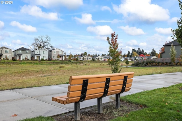 view of community featuring a yard