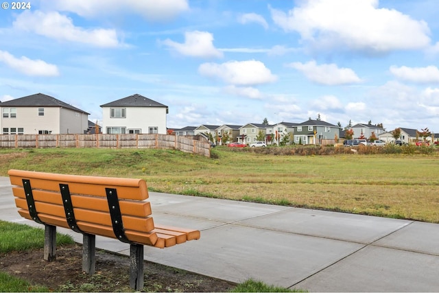 surrounding community with a lawn