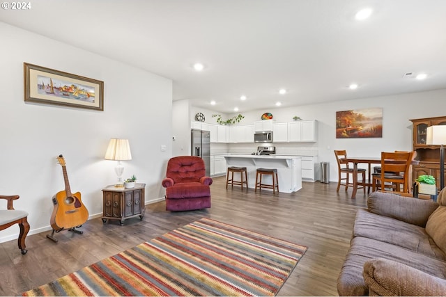 living room featuring dark hardwood / wood-style flooring