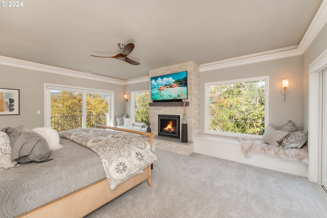 317 Aker Dr, Myrtle Creek, OR 97457 - bedroom featuring ornamental molding, carpet floors, a large fireplace, access to outside, and ceiling fan