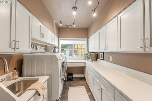 317 Aker Dr, Myrtle Creek, OR 97457 - laundry area featuring washing machine and dryer, cabinet space, dark wood-style flooring, and a desk