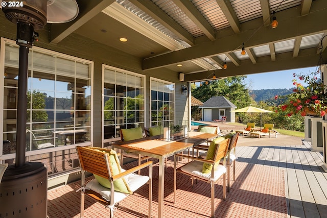 317 Aker Dr, Myrtle Creek, OR 97457 - view of patio / terrace featuring an outbuilding and outdoor dining space