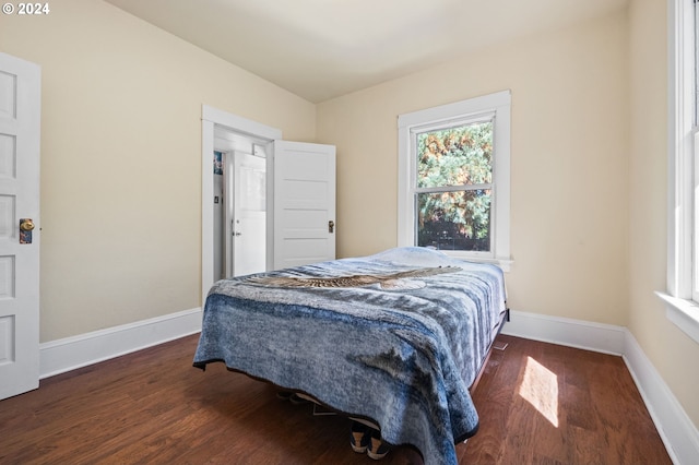 bedroom featuring dark hardwood / wood-style floors