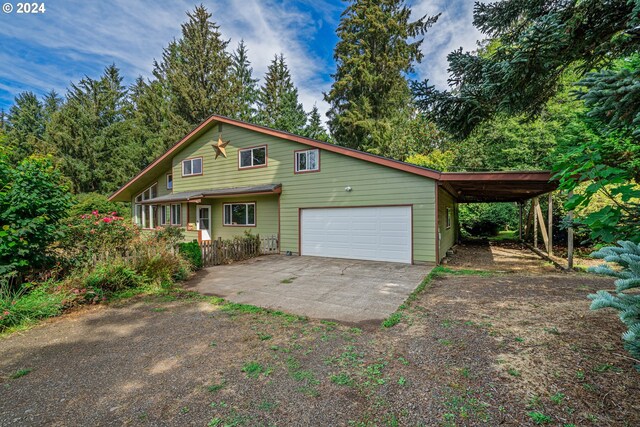 view of front of home featuring a carport