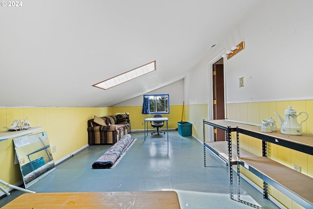 interior space featuring vaulted ceiling