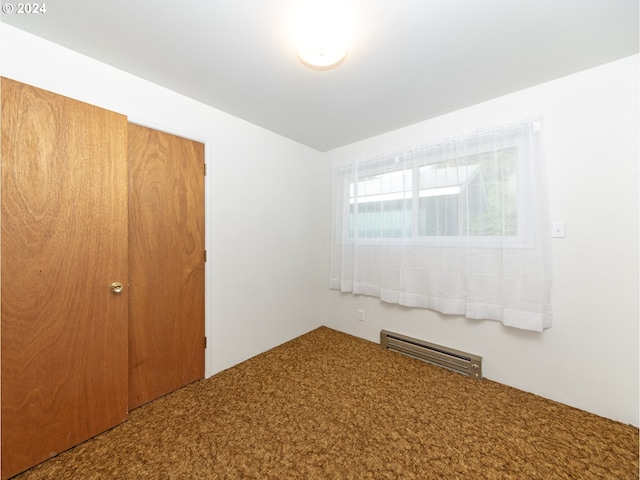 unfurnished bedroom featuring a closet and carpet flooring