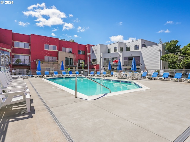 view of pool with a patio area