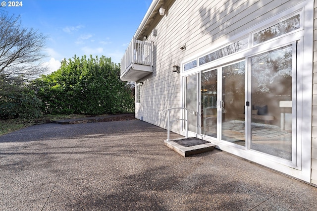 view of patio with a balcony