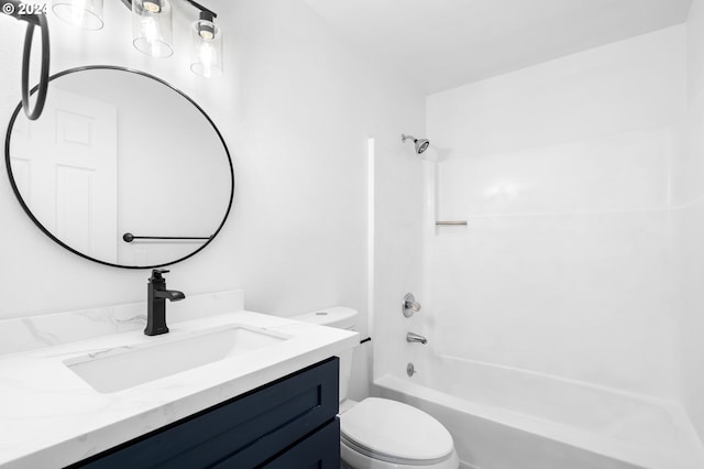 full bathroom with shower / bathing tub combination, vanity, and toilet