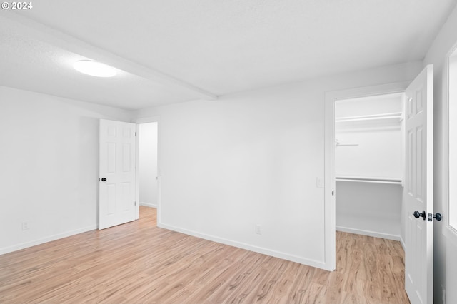 unfurnished room featuring light hardwood / wood-style floors