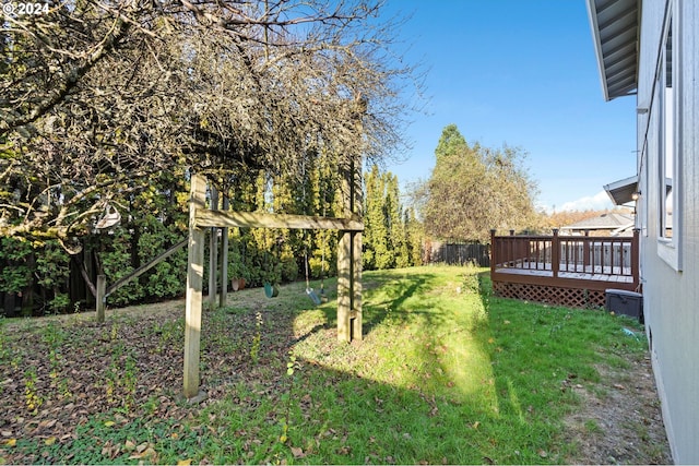 view of yard featuring a wooden deck