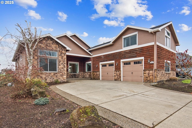 view of front facade featuring a garage and concrete driveway