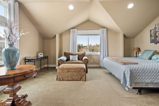 bedroom with lofted ceiling, recessed lighting, baseboards, and light colored carpet