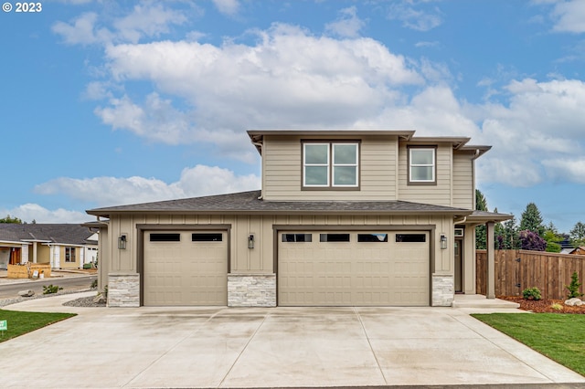 view of front of property featuring a garage