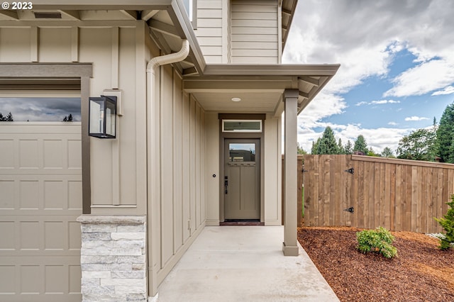 property entrance with a garage