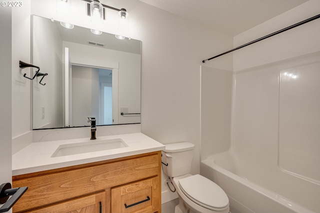 full bathroom with vanity, shower / bath combination, and toilet