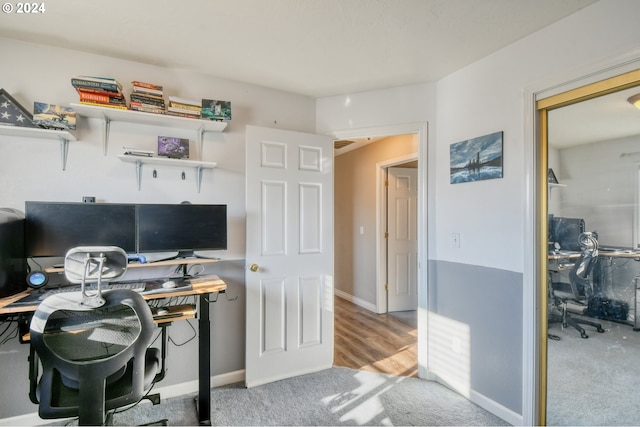 view of carpeted home office