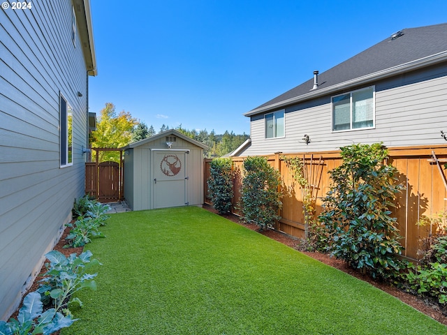 view of yard with a shed