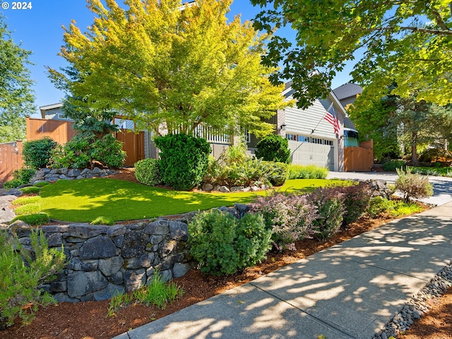 view of yard featuring a garage