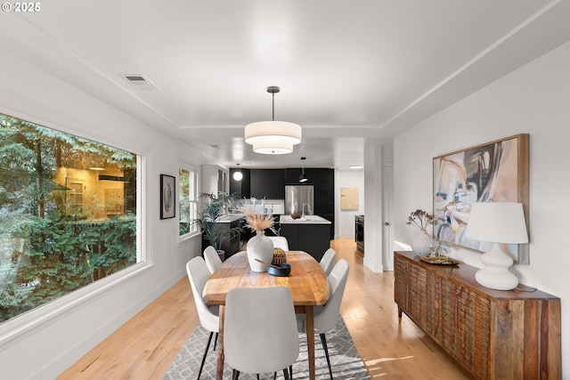 dining room featuring light hardwood / wood-style floors