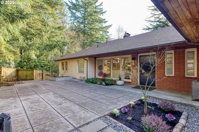 back of house with a patio area