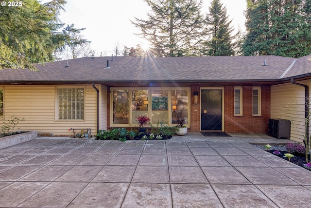 rear view of house featuring a patio area