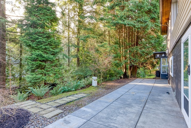 view of patio with central AC unit